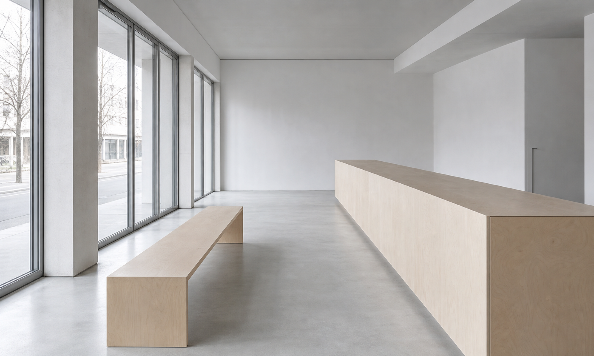 Interior of a minimal Nordic coffee bar: white concrete, a long pale birch counter and bench, cold daylight from floor-to-ceiling windows, empty and gallery-like.